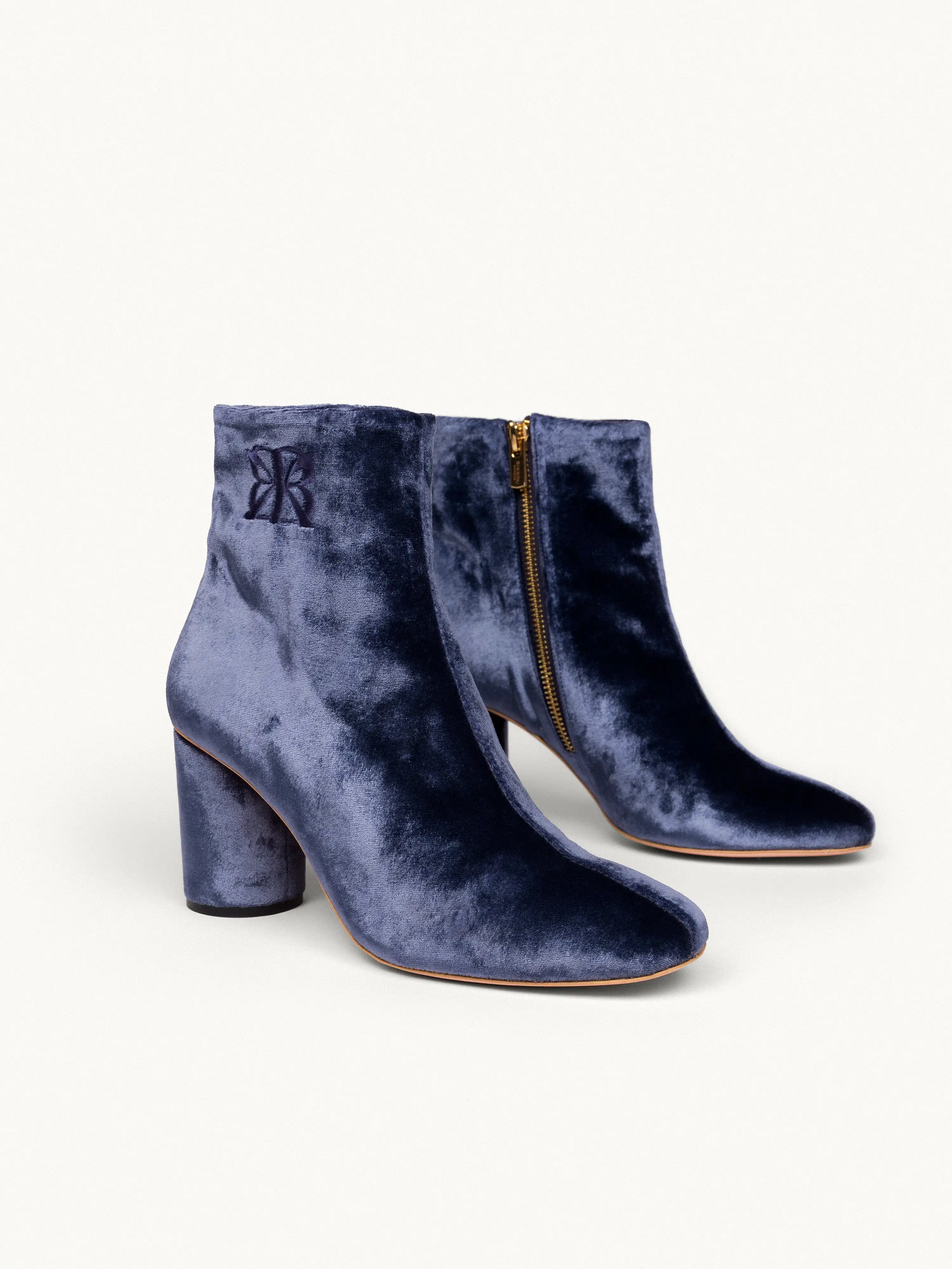 6pm Expo at the Gallery Vegan Velvet Heeled Boots | Indigo Blue