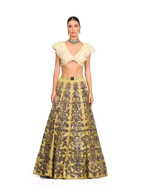 Beige Ruffle Blouse with Heavy Embroidered Sequin Lehenga