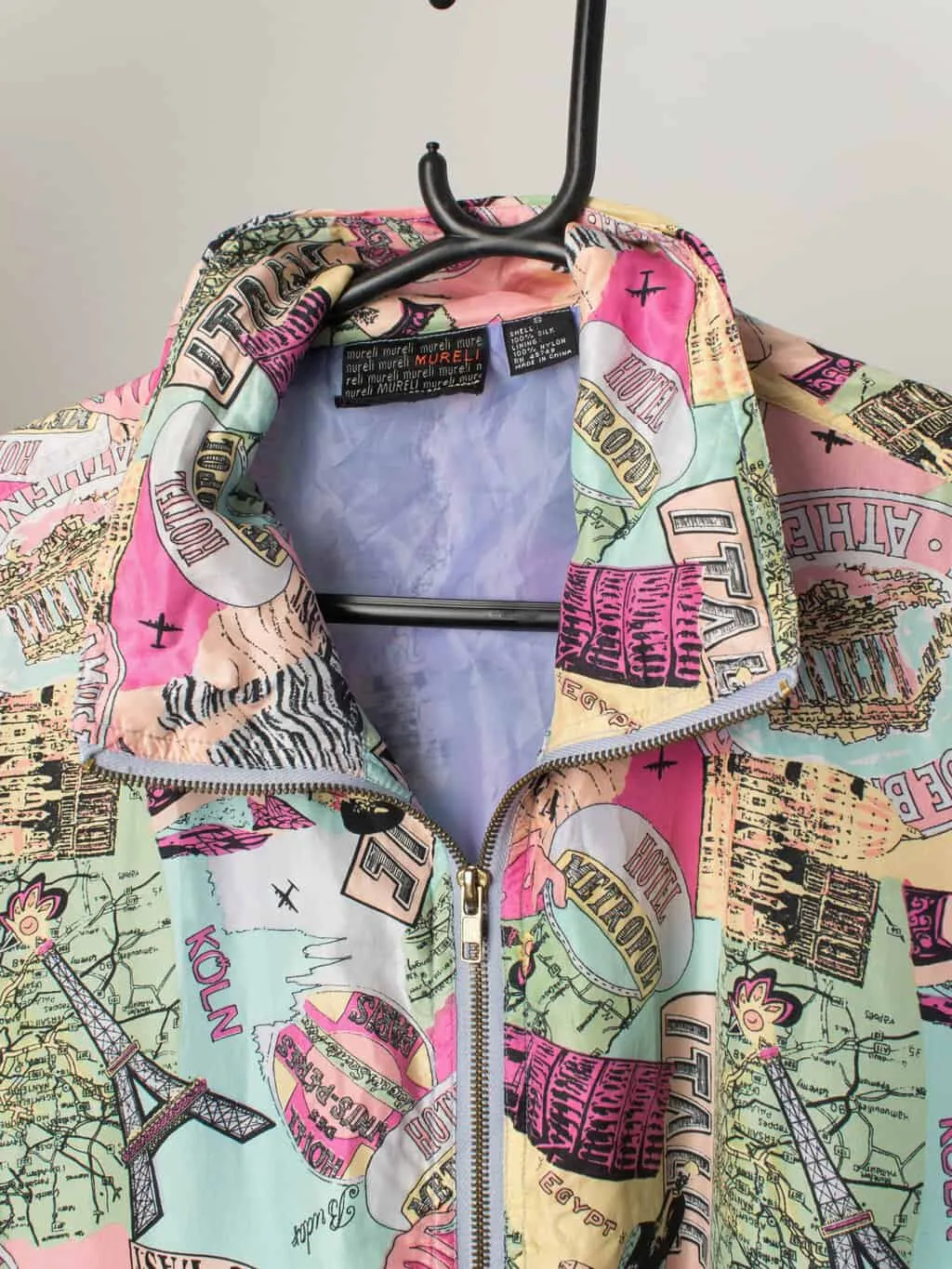 Vintage silk bomber jacket in pastel pink with European adventure city print – Medium / Large